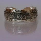 Браслет-оберег Цветок и два Феникса металлический широкий A439-10